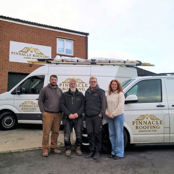 Kevin and team of Pinnacle Roofing with company van